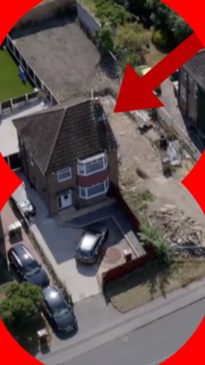 Aerial view of a semi-detached house with the plat to the right demolished.